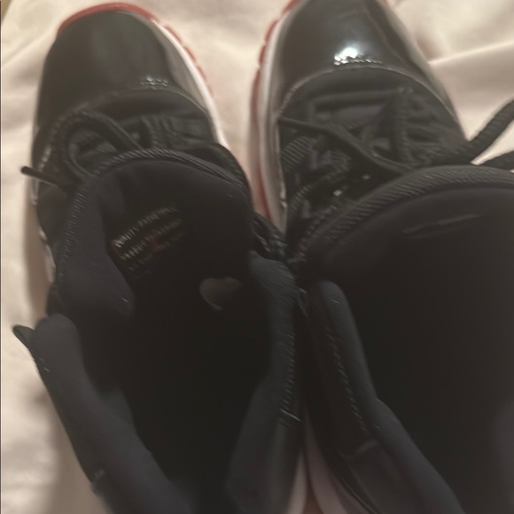 Air Jordan 11 Retro Black and Red Sneakers - Picture 6 of 7